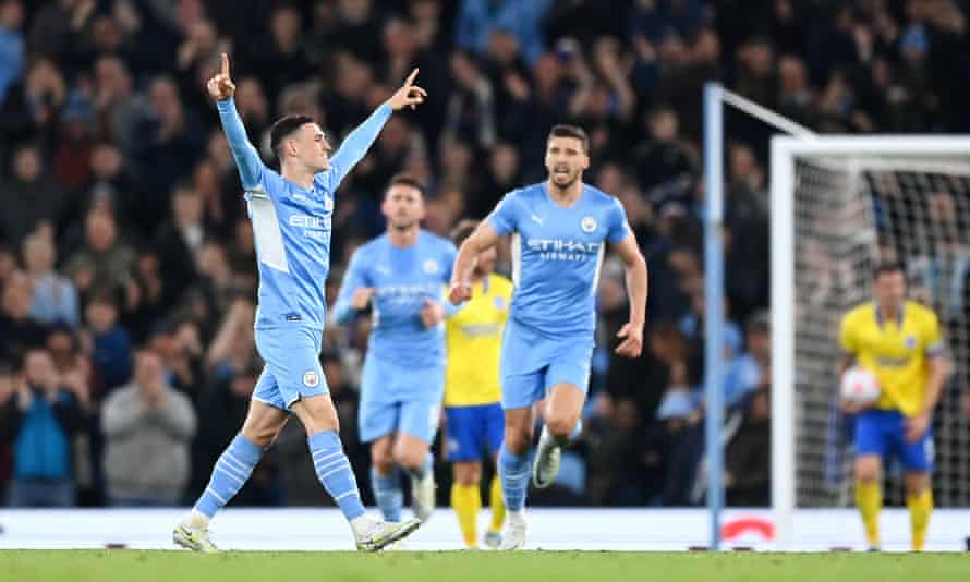 Phil Foden of Manchester City celebrates after scoring their team’s second goal.