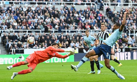 Ethan Pinnock of Brentford turns in Joelinton of Newcastle United's cross to score an own goal.