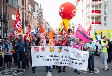 Protesters march during a May Day/ Labour Day rally in Lille, northern France.
