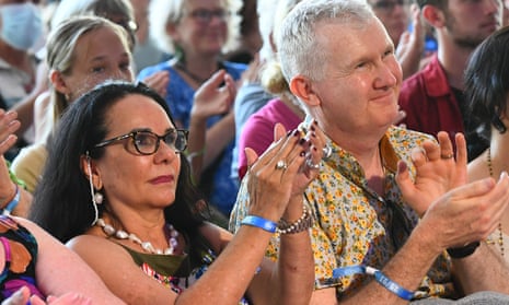 Minister for Indigenous Australians Linda Burney and Minister for employment Tony Burke look on from the crowd as prime minister Anthony Albanese speaks during the Woodford folk festival, north of Brisbane
