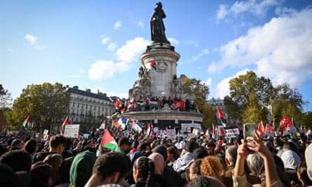 Protesters on a police-approved rally in support of the Palestinian people gather at the Place de la Republic, Paris, 22 October 2023. 