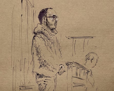 A court sketch of Daniel Kinahan wearing glasses and a hoodie standing with his hand clasped in front of him