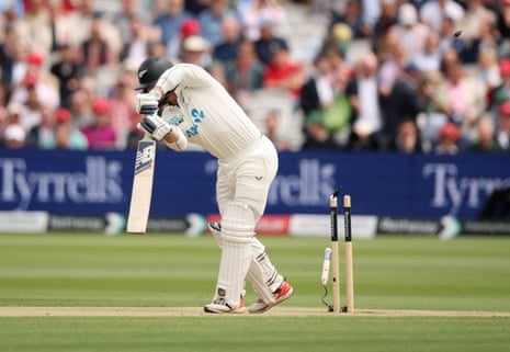 New Zealand's Glenn Phillips swipes at the ball which he misses and it clatters into his stumps.