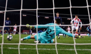 Paulo Gazzaniga stretches out a left boot to deny Red Star’s Milan Pavkov in the first half.