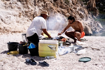 Cooking barbecue on a beach