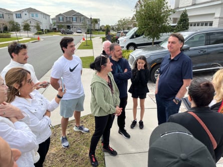 Brazil’s ex-president Jair Bolsonaro mingling with supporters outside his rented villa at Encore Resort at Reunion in Kissimmee. Florida.