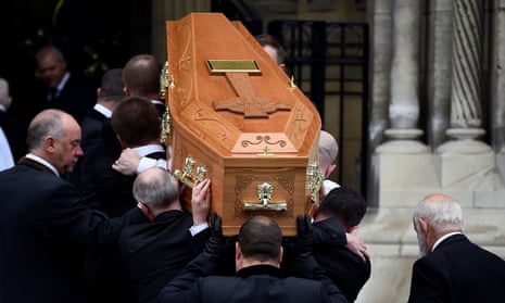 The coffin of Lyra McKee is carried into a Belfast cathedral for her funeral.