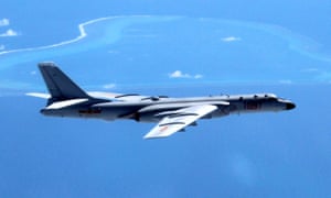 A Chinese H-6K bomber patrols the islands and reefs in the South China Sea