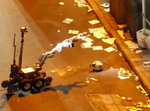 A police robot handles the unexploded pressure cooker bomb in West 27th Street in New York.