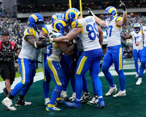 Kyren Williams and Rams teammates celebrate a touchdown together in the end zone