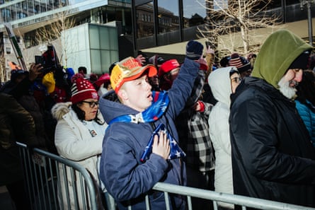 a man with his hands up