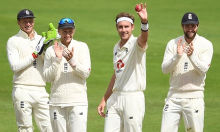 Stuart Broad salutes the empty stands at Old Trafford after dismissing Kraigg Brathwaite, his 500th Test wicket.