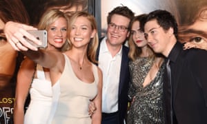 ‘I’ve spent the majority of my life in front of the camera’: Karlie Kloss takes a selfie with her sister Kimberly and John Green, Cara Delevingne and Nat Wolff at the premiere of Paper Towns. She has just launched Klossy, a YouTube channel.