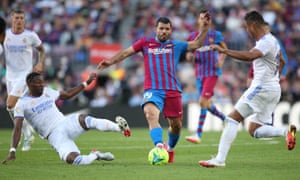LaLiga - FC Barcelona v Real Madrid<br>Soccer Football - LaLiga - FC Barcelona v Real Madrid - Camp Nou, Barcelona, Spain - October 24, 2021 FC Barcelona's Sergio Aguero in action with Real Madrid's David Alaba and Casemiro REUTERS/Albert Gea