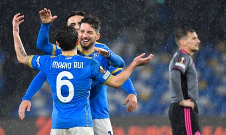 Napoli's Belgian forward Dries Mertens (C) celebrates with teammates after the final whistle.