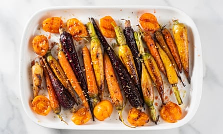 Let the vegetables cool in their baking dish, ready to reheat in the microwave the next day if oven space is limited.