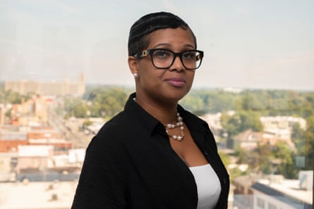 A woman wearing glasses outdoors