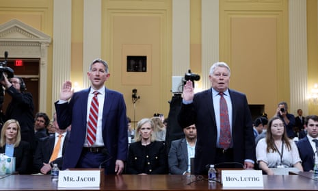 J Michael Luttig, right, is sworn-in to testify during a public hearing of the House select committee to investigate the January 6 attack, on 16 June 2022. 