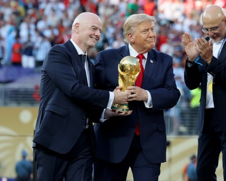 Gianni Infantino, left, and Donald Trump with the World Cup trophy after the final between Spain and Argentina, 19 July 2026.
