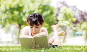 Young woman reading a book