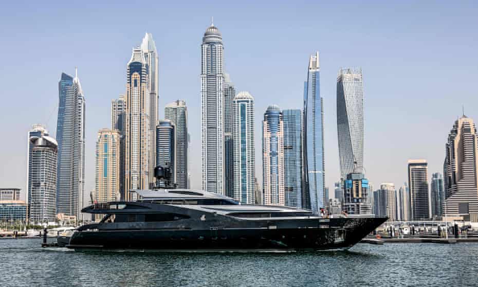 A luxury yacht is pictured off the Dubai Marina Beach in the Gulf emirate