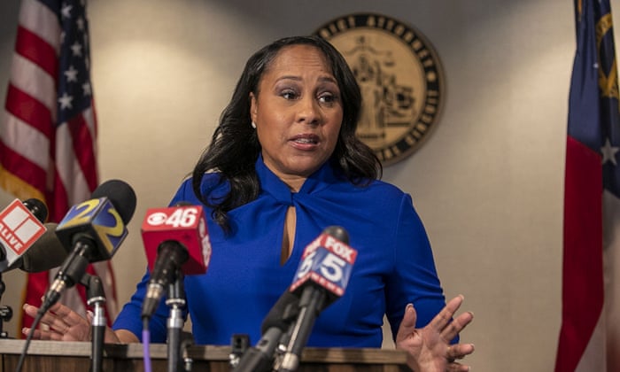 Fulton County District Attorney Fani Willis speaks during a news conference in Atlanta, Aug. 30, 2021. Former President Donald Trump recently told a mostly white crowd at a rally in Texas that his legal troubles are the fault of Black prosecutors he called racists. Trump repeated his charges of racism to underscore his contention that he couldn’t possibly be treated fairly by Black officials who are leading Trump investigations in New York and Georgia. Willis, the Georgia prosecutor, asked a judge to impanel a special grand jury to help probe possible “criminal disruptions” by Trump and his allies during the 2020 presidential election and its aftermath.