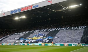 Newcastle United fans unveil a banner in St James' Park.