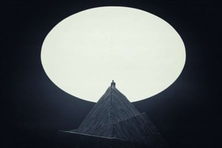 Kanye West atop a Devlin-designed mountain on the Yeezus tour.