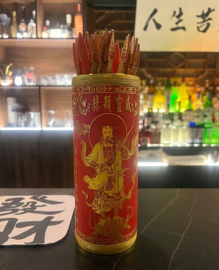 Fortune telling sticks, or qiuqian, at One As All bar in Beijing