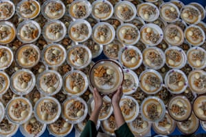 A woman prepares food for iftar in Yogyakarta, Indonesia