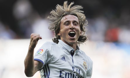 Luka Modric celebrates after scoring.