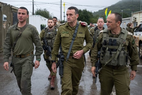 Chief of the general staff of the Israel Defense Forces Herzi Halevi walks along with other officials, during what the Israeli military says was a visit to al-Shifa hospital on Wednesday.