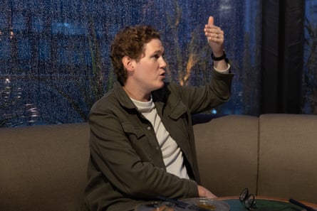 Patrick gesticulating while chatting in the restaurant