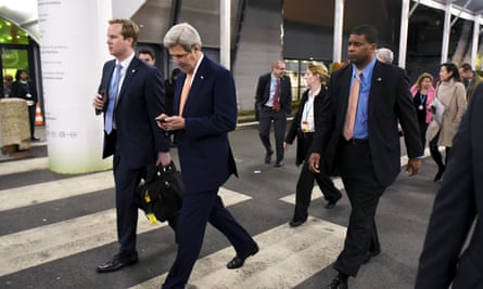 John Kerry leaves the COP 21 United Nations conference on climate change on the outskirts of Paris.