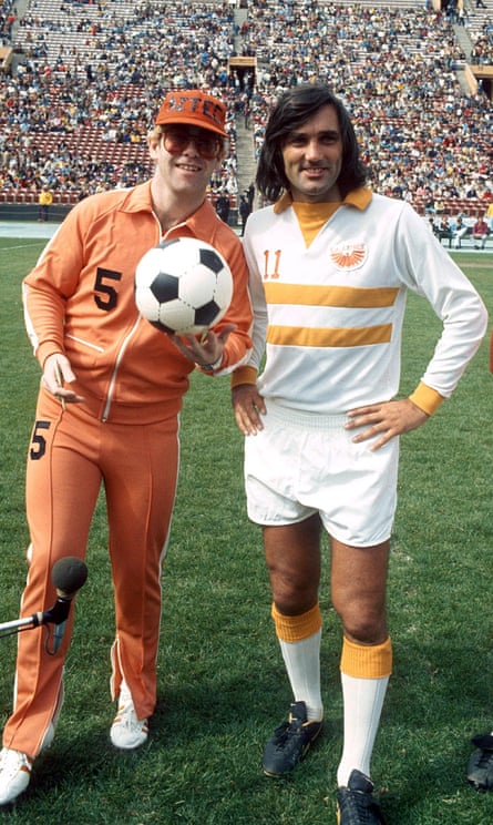 George Best (right) poses with Elton John while at LA Aztecs.