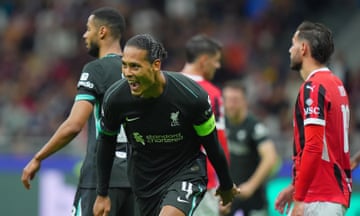 Virgil van Dijk celebrates after heading Liverpool 2-1 in front at San Siro