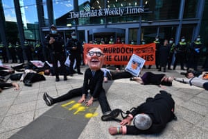 A protester dressed as Rupert Murdoch in Melbourne, Australia
