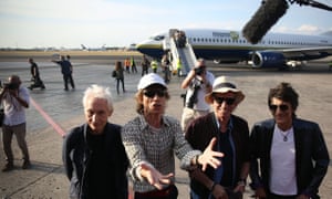 Charlie Watts, Mick Jagger, Keith Richards and Ronnie Wood talk to media on the runway