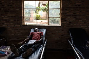 A man donates blood in the village of Byimana in Rwanda