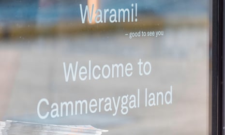 A sign on a shop window using local Aboriginal indigenous peoples language Warami meaning 'good to see you' on Cammeraygal Land in Sydney, Australia