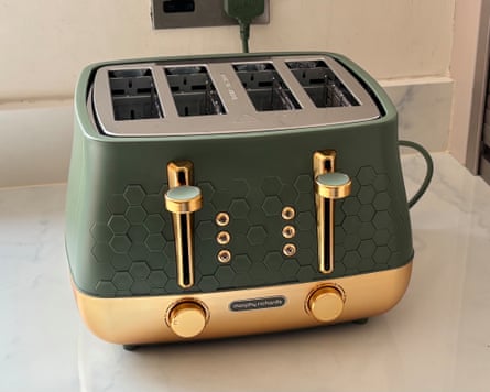 A green and gold Morphy Richards Cassini 4-Slice Toaster on a worktop