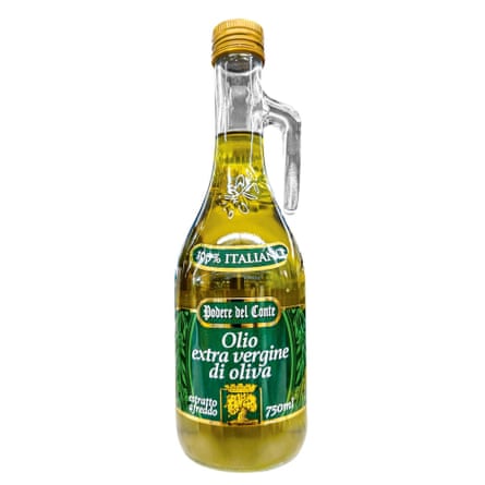 Italian extra virgin olive oil in a glass bottle with a handle