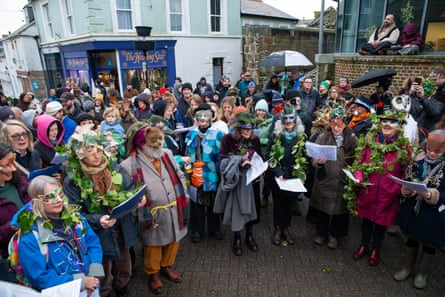 Festive performers overlooked by spectators.