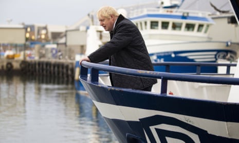 Boris Johnson on a fishing trawler during a visit to Peterhead in Scotland in September.