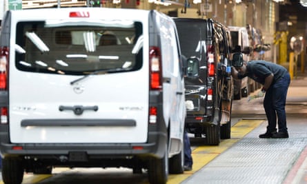 A Vauxhall worker inspects a van at the plant in Luton in 2015