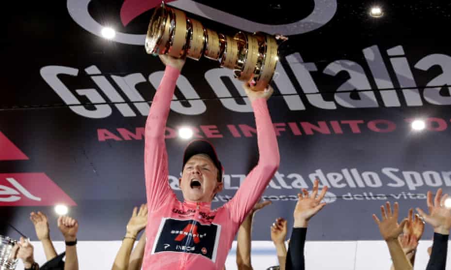 Great Britain’s Tao Geoghegan Hart holds up the trophy after winning last year’s Giro d’Italia in May 2020. The Londoner is expected to ride in support of Geraint Thomas for Ineos.