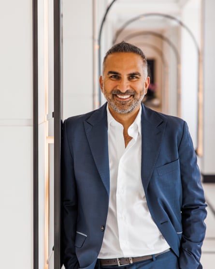 Malik smiles at camera