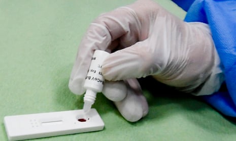 Medical staff conducting an antibody test