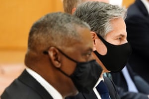 US defense secretary Lloyd Austin (L) and US secretary of state Antony Blinken (R) attend a meeting with Japanese prime minister Yoshihide Suga.