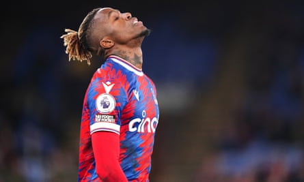 Wilfried Zaha reacts to heavy defeat to Spurs.
